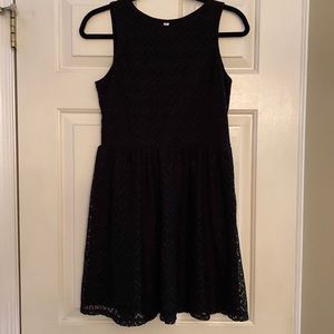 Black sleeveless dress with lace overlay